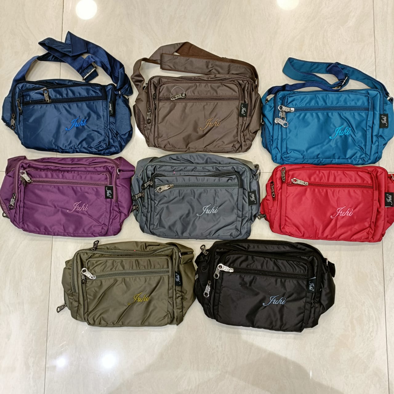 Abc's 7 pocket sling bag with seperate bottle and umbrella compartment